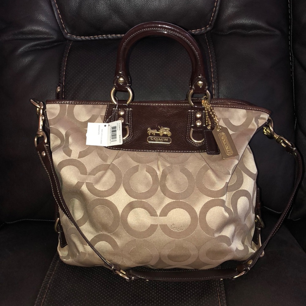 Brown and gold coach hand bag